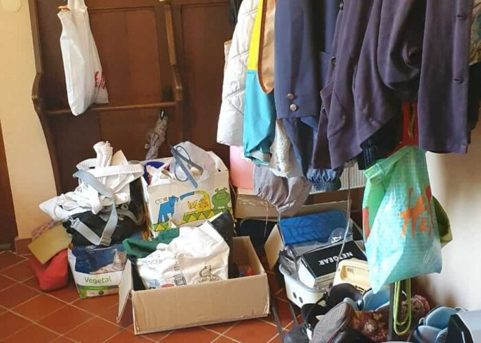 Very cluttered room, waiting only to be decluttered.